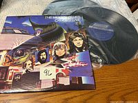 Front cover with both vinyl records partially visible