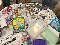 Entire assortment of craft supplies displayed on table