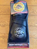 Gloves inside branded mesh case