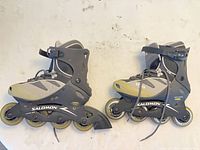 Both skates left side view showing wheels, frame and closures