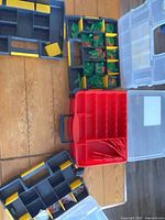 Group shot of all organizer boxes opened to show interiors and lids