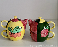 Both stackable tea-for-one sets side by side showing overall form and colour