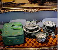 Full set displayed on table with carrier bag