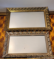 Top view showing both gold-tone mirrored trays