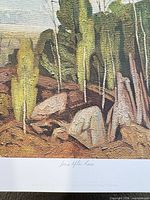 Close-up of centre portion showing title inscription and foreground rocks