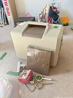 Carrying case with extension table, walking foot box, knee lift, hoop and accessories in front