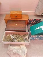 overall lot showing shoebox of brasses, three wooden boxes and floral box