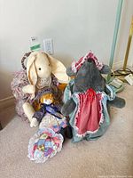 Group shot showing bunny, mouse, rag doll, and heart pillow