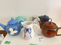 Front view of all six items on shelf