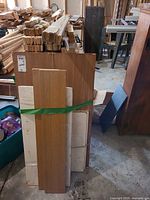 Front view of bundled wood panels and trim pieces