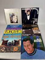 Group shot showing seven album covers including Bacharach, Humperdinck, Tomita, Toronto Music Machine, Andy Williams and two unidentified