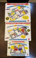 Front view of three Snap Circuits kit boxes showing models SC-500, SC-300, SC-100