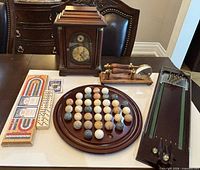 All items grouped on tabletop showing scale and general condition