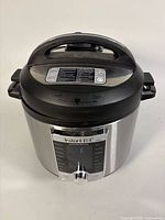 Front view of Instant Pot Ultra 60 showing stainless body and lid