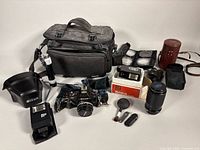 Overview of camera, flashes, lenses, bag and accessories