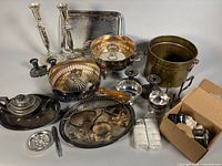 Group shot of entire lot showing all silver-plated pieces and brass bucket