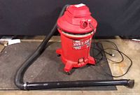 Full view of Craftsman wet/dry vacuum with hose and wand