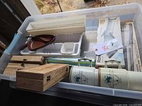 Entire lot inside clear bin showing all items