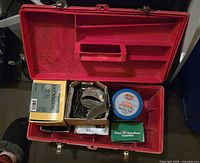 Toolbox open with tray fitted and hardware inside