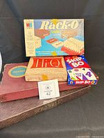 Group shot of all five vintage game boxes