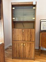 Full frontal view of cabinet showing all four sections and overall appearance