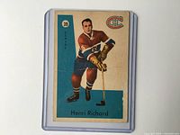 Front view of 1959 Parkhurst Henri Richard #39 card showing player image and team logo