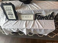 All three wall décor items displayed together