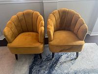 Front view of both chairs showing design, color and condition