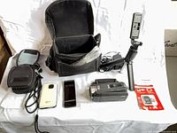 Lot overview: camcorder, Kodak recorder, Sony recorder, tripod, memory card pack, two cases