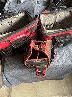 Two large rolling Husky tool bags and one small tote showing overall style and size comparison