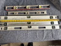 All five spirit levels laid out together for size comparison