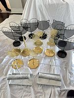 All eight jewelry stands arranged on sheet showing heart, cat, gold and white designs