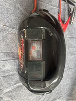 Top view of power box showing digital display and branding