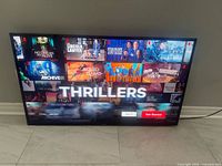 Front view of Samsung TV displaying streaming service interface