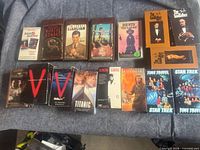 Front view showing all VHS tapes laid out in two rows