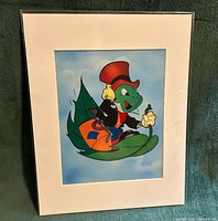 Front view of the matted sericel showing Jiminy Cricket artwork