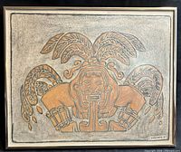 Full view of framed relief rubbing artwork