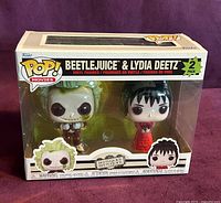 Front of sealed Funko Pop! Movies Beetlejuice & Lydia Deetz 2-pack showing figures and box graphics