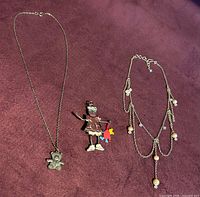 Group shot of all three jewellery pieces laid out