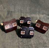 Group shot of all four View-Master viewers showing colors and styles