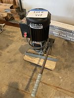 Front view of Delta mortiser showing motor, switch, lever and base