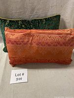 Front view showing patterned silk faces of both pillows