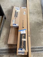 Stacked Armstrong PeakForm XL boxes including two mid-length boxes and top of 12 ft box