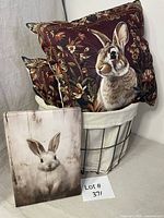 Overall lot showing basket, two pillows, canvas print