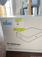 Front of boxed Idoo queen air mattress