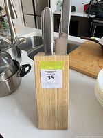Knife block with three knives inserted