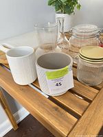 Group shot of all containers on wooden surface