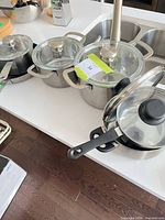 Group shot of all cookware pieces on countertop