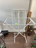 X-frame drying rack opened with wings extended