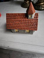 Front and roof view showing overall design and painted details